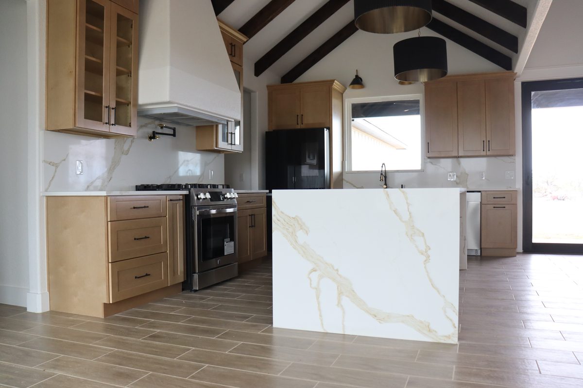 Oak kitchen with exposed beams and range